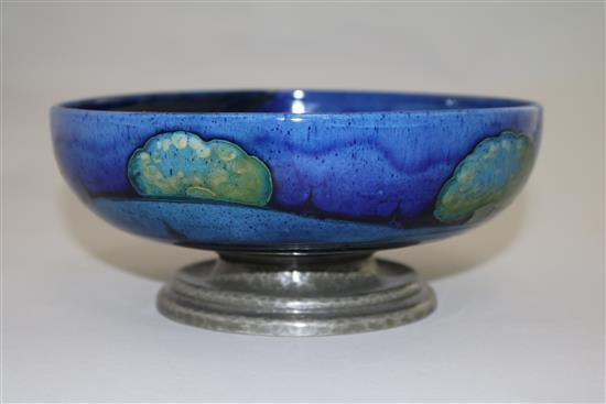 A Moorcroft Moonlit Blue pattern Tudric pewter footed bowl, c.1920, diameter 19.5cm, restorations